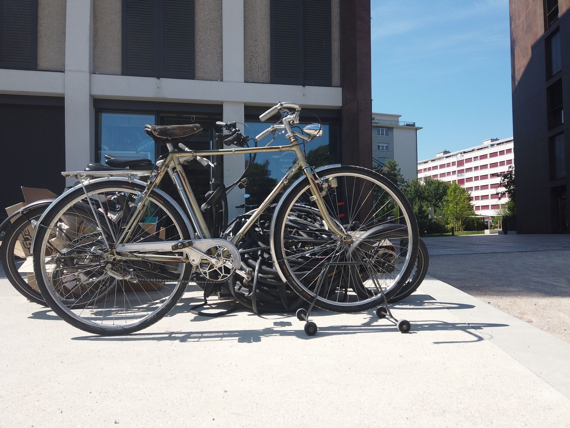 a bicycle in front of the shop